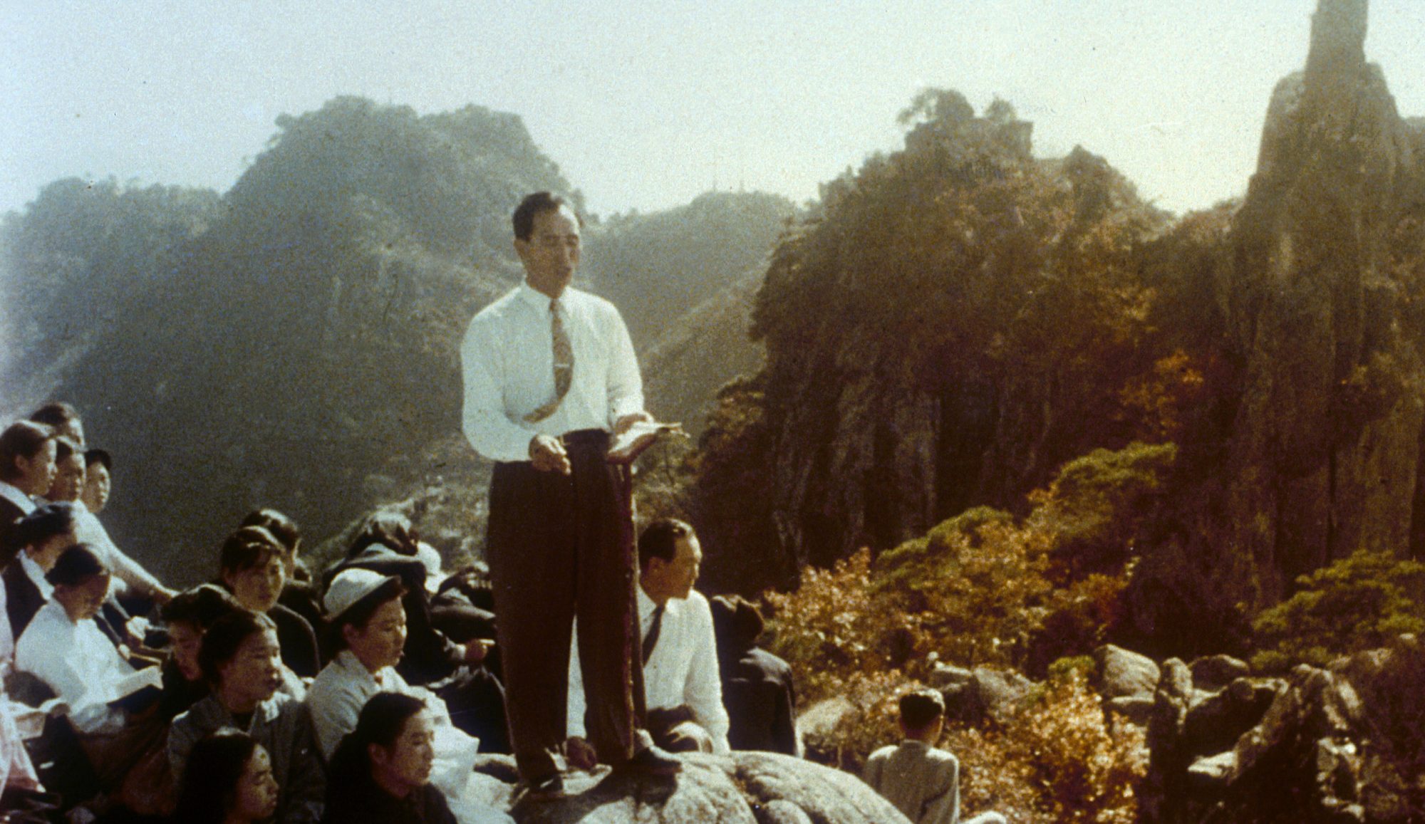 Sun Myung Moon teaching on mountainside
